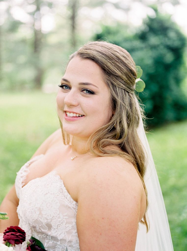 portrait of a bride at her wedding at the Greencloft Club in Charlottesville VA