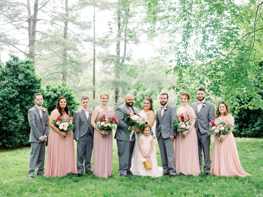 bride, groom, and bridesmaids and groomsmen at Greencloft Club wedding in charlottesville VA