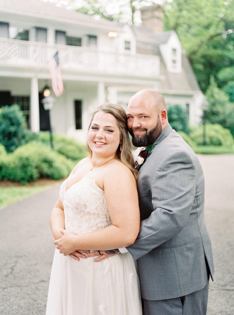 portrait of a bride and groom at the greencloft club in charlottesville va