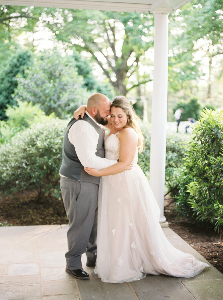 portrait of a bride and groom at the greencloft club in charlottesville va